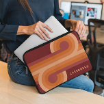 Custom Orange Dark Maroon Red Retro Art Pattern Laptop Sleeve<br><div class="desc">Beautiful contemporary red, dark, and light-coloured orange coloured geometric circles and lines pattern on a maroon background. With room to customize or personalize with a name, monogram, or initials of your choice. Ornate, elegant, and funky hipster design for the artistic artsy fashion diva, popular hip trendsetter, vintage retro, nouveau deco...</div>
