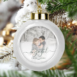 Custom Photo First Christmas Engaged Green Script Ceramic Ball Christmas Ornament<br><div class="desc">Commemorate your engagement with this beautiful modern keepsake ornament. The green text reads "Our first Christmas engaged, " with the word "engaged" in elegant handwriting script with flourishes before and after. Replace the sample image with your favourite photo, and add your names and the year. A white gradient filter helps...</div>