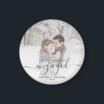 Custom Photo First Christmas Engaged Grey Script Magnet<br><div class="desc">Commemorate your engagement with this modern keepsake magnet. The grey text reads "Our first Christmas engaged, " with the word "engaged" in whimsical handwriting script with flourishes before and after. Replace the sample image with your favourite photo, and add your names and the year. A white gradient filter helps make...</div>