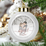 Custom Photo First Christmas Engaged Red Script Ceramic Ball Christmas Ornament<br><div class="desc">Commemorate your engagement with this beautiful modern keepsake ornament. The dark red text reads "Our first Christmas engaged, " with the word "engaged" in elegant handwriting script with flourishes before and after. Replace the sample image with your favourite photo, and add your names and the year. A white gradient filter...</div>