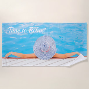 Custom photograph woman relaxing in swimming pool, beach towel