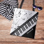 Custom Piano Music Notes Script Name Black White Tote Bag<br><div class="desc">Personalized modern, stylish music tote bag featuring a piano keyboard and music notes in your choice of colour to replace the white background. Personalize with a name or monogram and/or other text in your choice of font style, colour and size. The sample is shown black and white. The design is...</div>