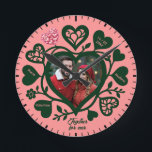 Custom Pink Green Photo Heart Clock<br><div class="desc">This unique wall clock is special because it transforms a standard timepiece into a cherished romantic keepsake by featuring your favourite couple's photo at the heart of the design. Set against a soft pink background with deep forest green decorative hearts and customizable names, it tells a distinctive story of love...</div>