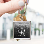 Custom Silver Glitter Black Sparkle Monogram Keychain<br><div class="desc">Easily personalize this trendy elegant keychain design featuring pretty silver sparkling glitter on a black brushed metallic background.</div>