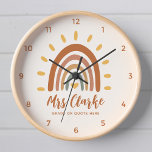 Custom Teacher Name Quote Boho Rainbow Sun Clock<br><div class="desc">Custom Teacher Name Quote Boho Rainbow Sun Classroom wall clock is a unique and stylish accessory that combines bohemian and earthy elements with a vibrant rainbow sun. In addition to the striking graphic, the clock can also be customized with your teacher name, as well as the grade or any other...</div>