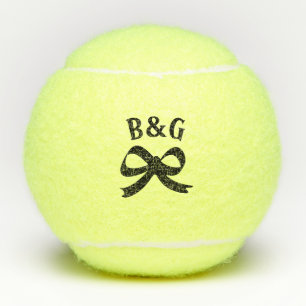 Custom tennis balls with wedding monogram and bow