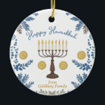 Custom text Hanukkah Festival of Lights Keepsake Ceramic Ornament<br><div class="desc">This delightful Hanukkah ceramic circle ornament, named “Festival of Lights Keepsake, ” is a perfect addition to your holiday decor. It features a beautifully crafted menorah with glowing candles, surrounded by intricate blue and gold patterns of leaves and coins, evoking the festive spirit of Hanukkah. The elegant script “Happy Hanukkah”...</div>