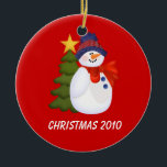 Customizable Snowman and Christmas Tree Ceramic Ornament<br><div class="desc">Snowman and Christmas Tree Ornament on a red background.</div>