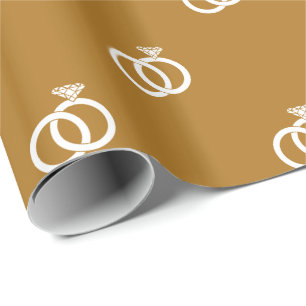 Customizable White Wedding Rings on Matte Gold Wrapping Paper