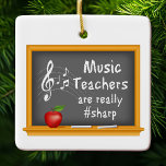 Customize Your Music Teachers  Ceramic Ornament<br><div class="desc">Show your appreciation for the sharpest music teacher around with our customizable "Music Teachers Are Really Sharp" ornament! This charming ornament features a blackboard theme with a treble clef and music notes, making it the perfect holiday gift for the music lover in your life. Personalize it with a name, date,...</div>
