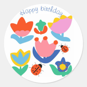Customized colourful tulips with ladybugs classic round sticker