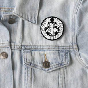 Cut bamboo in embracing bamboo leaves 2 inch round button
