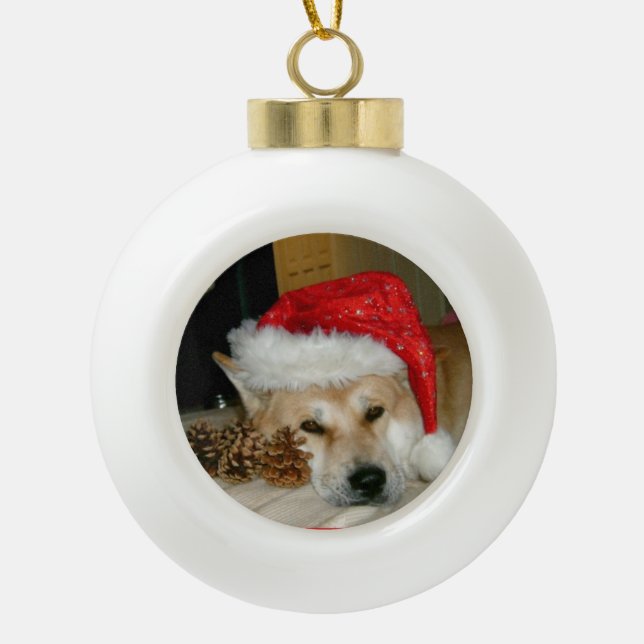 Cute akita in red santa hat with christmas cones ceramic ball christmas ornament (Front)