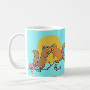 Cute and romantic squirrels on branch with flowers coffee mug