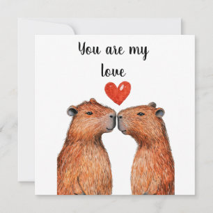 cute animals capybaras with hearts painted  holiday card
