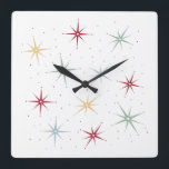 Cute Atomic Starburst Mid Century Pattern Square Wall Clock<br><div class="desc">Liven up your room with this fabulous atomic era mid century wall clock. This design features starbursts in red,  blue,  green,  and yellow and accented with black dots.</div>