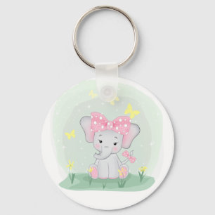  Cute baby elephant with a pink bow in a clearing  Keychain