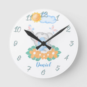 Cute Baby Elephant with orange flowers Wall Clock