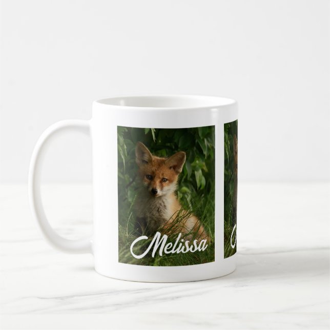 Cute Baby Fox in a Green Forest Coffee Mug (Left)