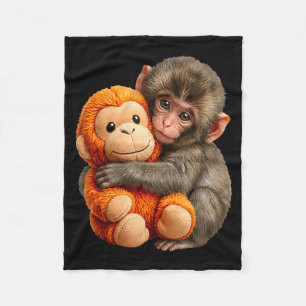 Cute baby monkey named punch plush hugging loverCu Fleece Blanket