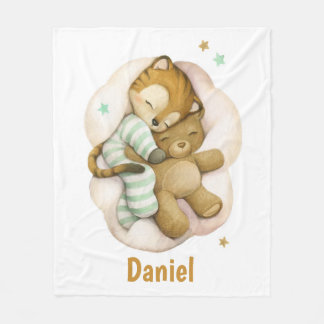 Cute baby tiger sleeping on a cloud fleece blanket