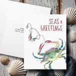 Cute Beach Christmas Cards Watercolor Crab<br><div class="desc">Send holiday cheer with these watercolor Christmas cards featuring a festive crab tangled in colourful holiday lights in shades of red, green, blue, and turquoise. Perfect for a nautical or coastal holiday theme, these cute Xmas cards capture the spirit of the beach with the playful phrase “Seas and Greetings” in...</div>