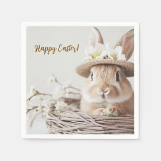 cute beautiful bunny in a hat in a basket napkin