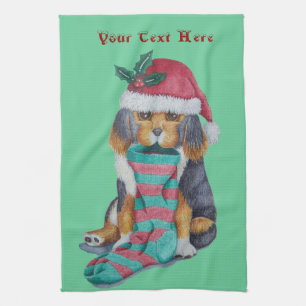 cute black and brown puppy with christmas stocking kitchen towel