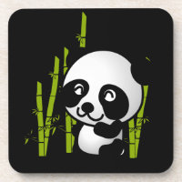 Cute black and white panda bear in a bamboo grove.