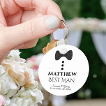 Cute Black Tie Tuxedo Best Man Wedding Favour Keychain<br><div class="desc">This fun keychain is designed as a gift for your Best Man. Features a cute mock tuxedo design with a black bow tie and buttons on a white background. The text reads "Best Man" and has a place for his name along with the names of the wedding couple and the...</div>
