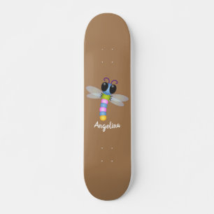 Cute blue and pink dragonfly cartoon illustration skateboard