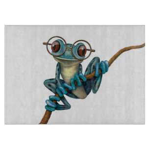 Cute Blue Tree Frog with Eye Glasses on White Cutting Board