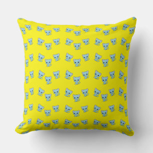 Cute bouncy blue kitten on yellow throw pillow