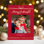 Cute Bow Merry & Bright Photo Red   Gold  Foil Holiday Card<br><div class="desc">This modern holiday photo card features one square photo, festive red background, and a string bow with the greeting "Merry & Bright" in gold foil. This design accommodates a single square photo (you can add more photos to the back). On the reverse side is the same red background, to which...</div>