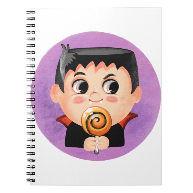 Cute boy in a vampire Halloween costume Notebook (Front)