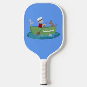 Cute boy sailor and dog rowing boat cartoon pickleball paddle