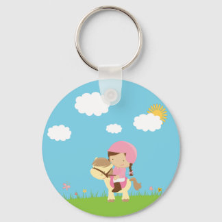 Cute brown hair girl riding a horse keychain