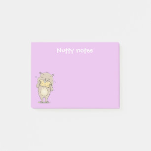 Cute brown hamster eating a peanut cartoon post-it notes