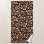 Cute Brown Red Green Christmas Gingerbreads Beach Towel<br><div class="desc">Sweet Christmas pattern with smiling Gingerbread Man cookies and snowflakes. Simple,  modern ,  colourful gingerbread pattern xmas design.  Perfect gift for your friends and family for winter holidays.</div>