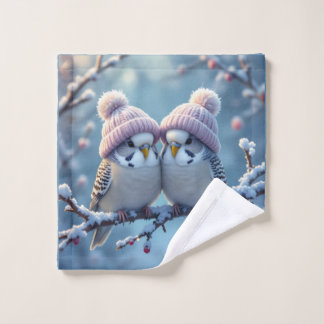 Cute budgies with bobble hats on a branch