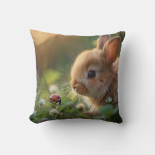 Cute bunny rabbit and a ladybug on the green field throw pillow