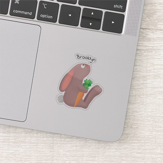 Cute bunny rabbit sitting with carrot cartoon (Detail)