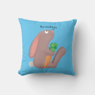 Cute bunny rabbit sitting with carrot cartoon throw pillow