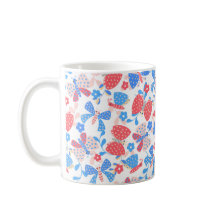 Cute butterfly in a flower garden in red and blue