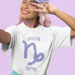 Cute Capricorn Astrology Sign Personalized Women's T-Shirt<br><div class="desc">This pretty purple and lavender Capricorn women's t-shirt features your astrological sign from the Zodiac in a beautiful sparkle like the constellations. Customize this cute tee gift with your name in beautiful cursive script for someone with a late December or early January birthday.</div>