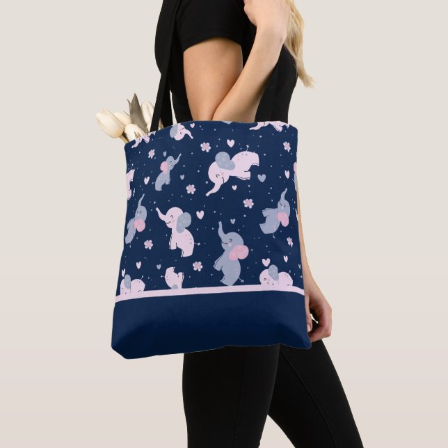 Cute cartoon elephants pattern on navy-blue tote bag (Close Up)