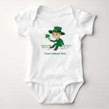 Cute cartoon leprechaun with shamrock and rainbow