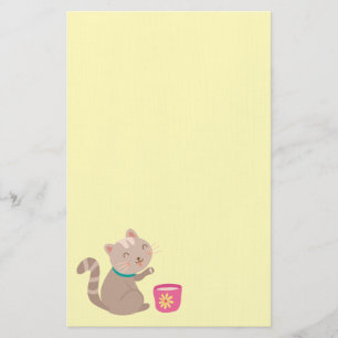 Cute cat in teacup cartoon on mint stationery