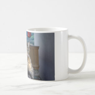 Cute Cat Interrupted While Grooming Coffee Mug
