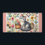 Cute Cat on Floral Quilt Cottagecore Desk Mat<br><div class="desc">A delightful gray tabby kitten sits sweetly among blooming flowers in this cozy, cottagecore-inspired design. The backdrop features a vibrant patchwork quilt filled with charming geometric patterns, soft pastels, and vintage textures that evoke feelings of warmth and nostalgia. Surrounding the kitten are blooming sunflowers, roses, and daisies, along with cheerful...</div>